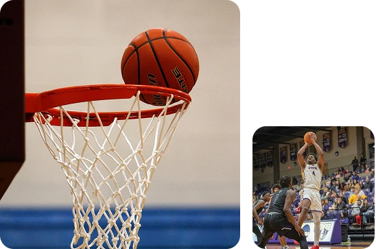 A basketball player in a white jersey jumps to shoot the ball, facing an opponent in a black jersey. A crowd watches from the stands with anticipation.
